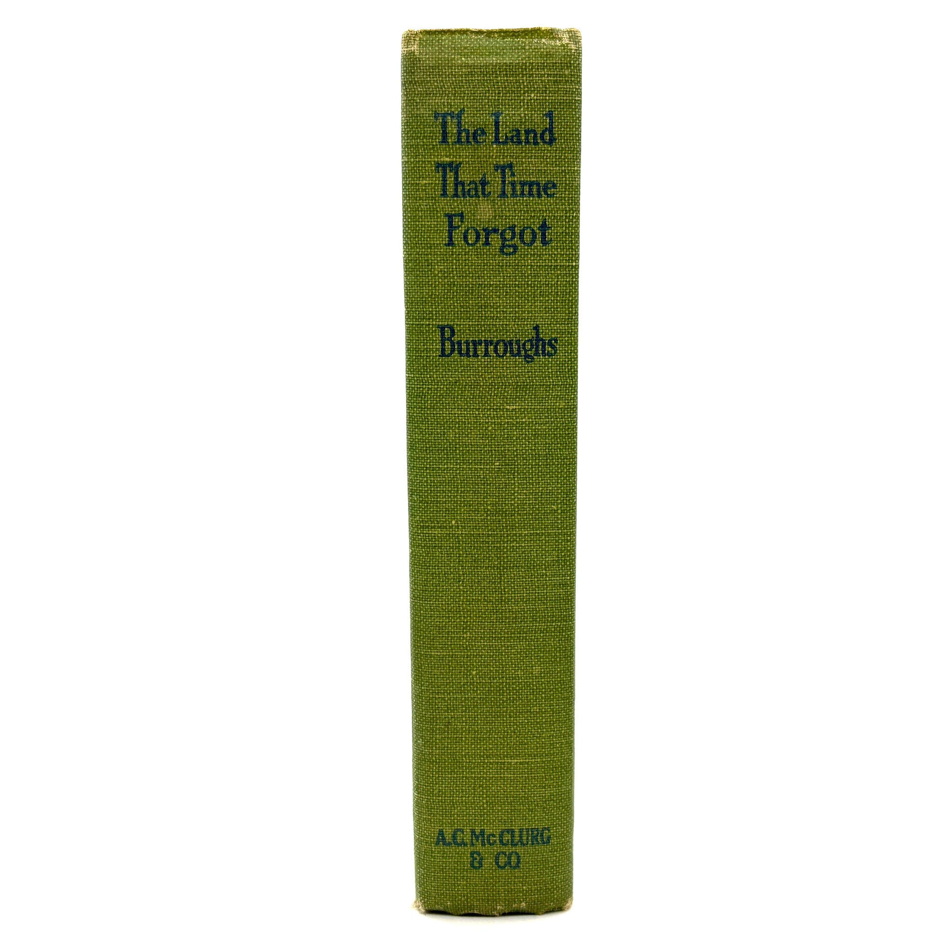 Green book titled 'The Land That Time Forgot' by Burroughs on a white background