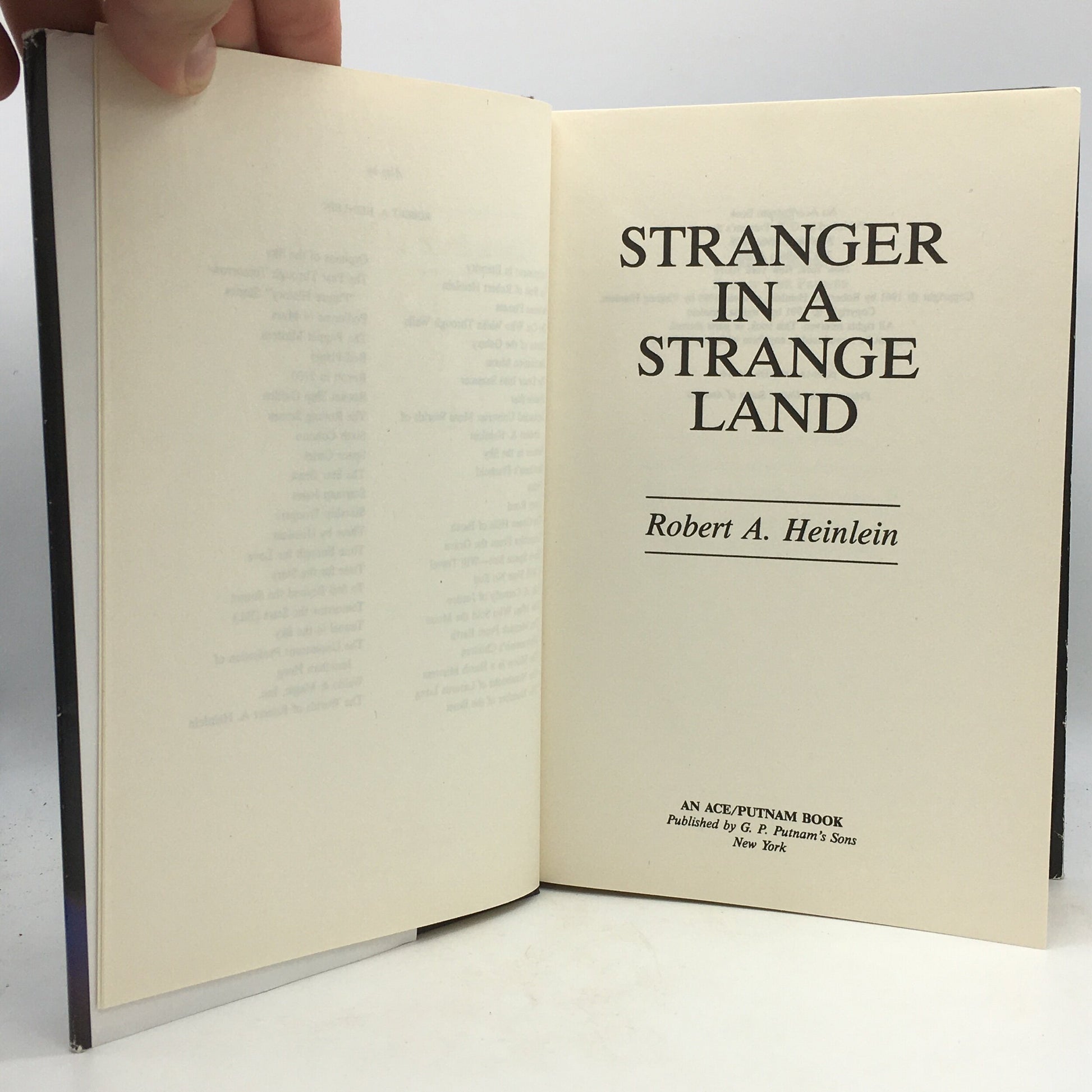 HEINLEIN, Robert "Stranger in a Strange Land (Uncut Version)" [Ace/Putnam, 1991] - Buzz Bookstore
